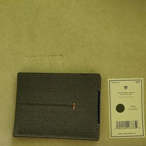Rothys brand new minimalist wallet pistachio